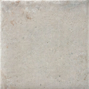 Saint-andrews-gris-45x45 Baldosa cerámica efecto hormigón beige-gris con textura y bordes desgastados