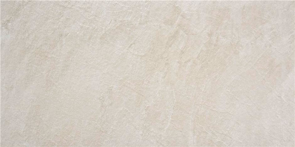 Loseta cerámica crema con textura y sutil veteado tipo piedra