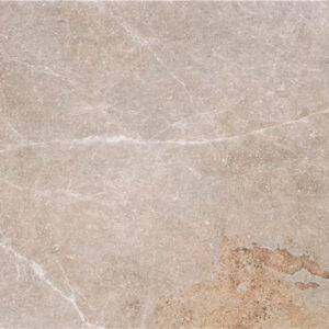 Azulejo cerámico beige con vetas blancas y mancha marrón, acabado mate