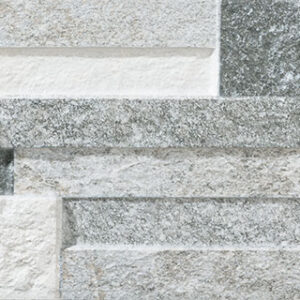 Azulejo cerámico imitación piedra apilada en tonos grises y blanco