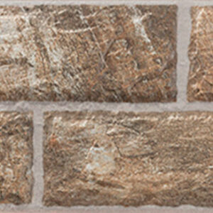 Azulejos cerámicos rectangulares efecto piedra marrón con juntas visibles
