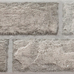 Azulejos rectangulares estilo ladrillo en tonos gris y crema con textura rugosa