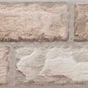 Azulejo cerámico efecto ladrillo rústico beige con textura y juntas visibles