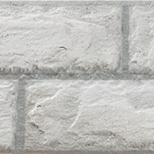 Azulejo cerámico blanco texturizado imitación ladrillo con juntas grises