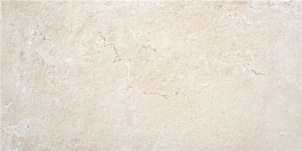Azulejo crema efecto piedra con vetas suaves y textura mate