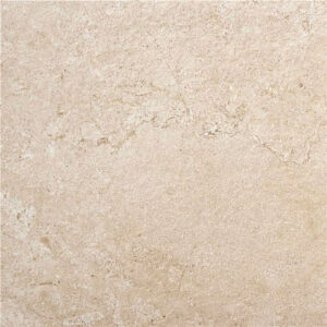 Baldosa cerámica beige efecto piedra con vetas y textura mate