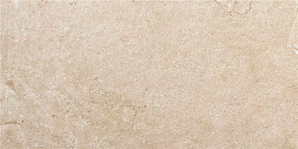 Azulejo cerámico beige efecto piedra con textura arenosa y vetas sutiles