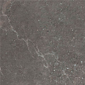 Baldosa cerámica gris oscuro efecto piedra con vetas y pequeñas inclusiones