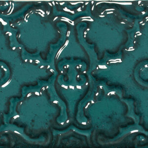 Azulejo cerámico rectangular en relieve brillo turquesa con motivos florales