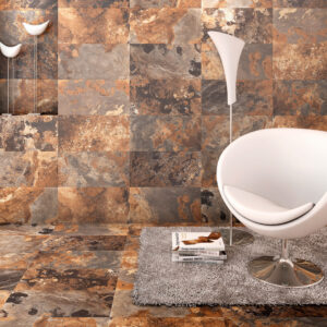 Silla blanca moderna sobre alfombra gris frente a pavimento y revestimiento cerámico efecto piedra