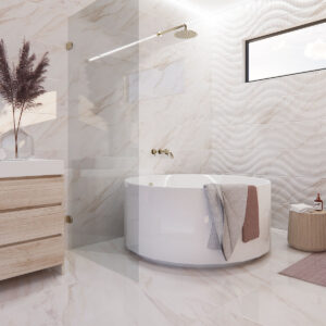 AMB-01-calacatta-gold-30X90 Baño exposición con bañera redonda, azulejos efecto mármol y revestimiento ondulado
