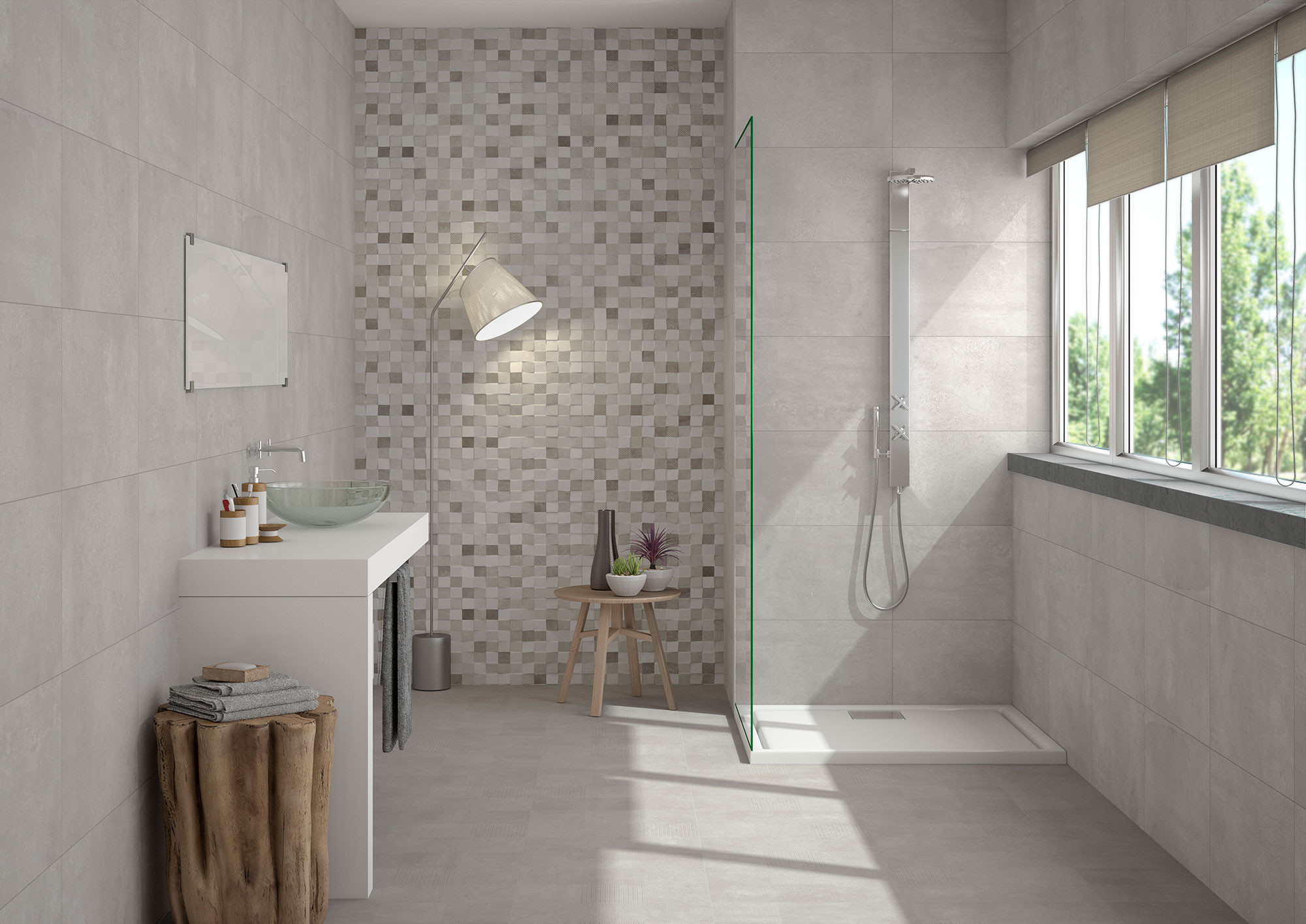 Baño de exposición con ducha, lavabo y revestimientos cerámicos grises y mosaico