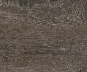Pavimento porcelánico efecto madera grisáceo con vetas y nudos