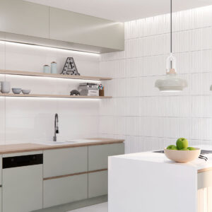 EDEN_PB_Amb_Blanco_30x90_01_0522 Expositor de cocina con azulejos cerámicos blancos texturizados, encimera e isla