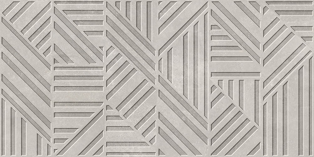 Azulejo cerámico gris con diseño geométrico de bandas en relieve