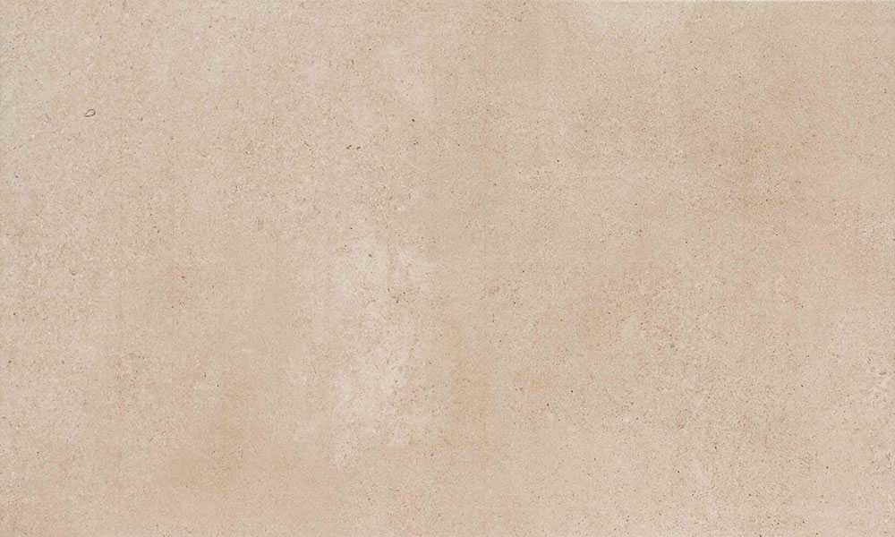 Azulejo cerámico beige jaspeado con textura mate tipo hormigón