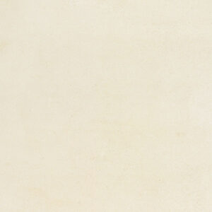 Azulejo cerámico crema con suave textura y ligero moteado