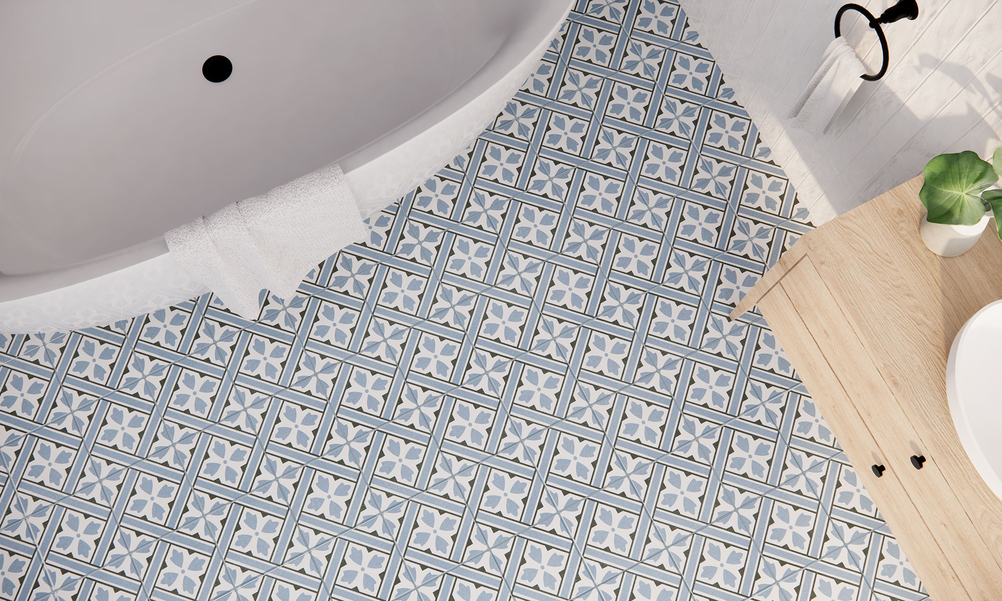 Azulejos cerámicos azul y blanco con patrón geométrico floral en baño