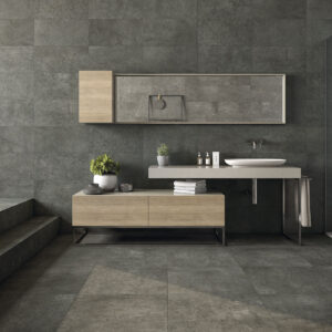 Baño moderno con pavimento y revestimiento cerámico gris, mueble flotante y ducha