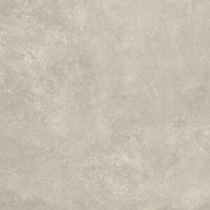 Baldosa cerámica efecto cemento beige grisáceo con textura sutil