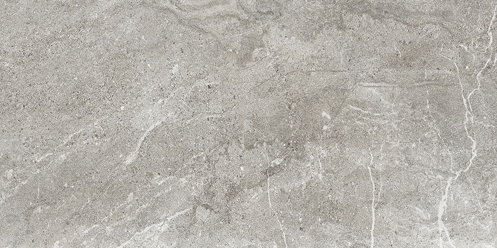 Baldosa cerámica gris efecto piedra con vetas y textura rugosa sutil