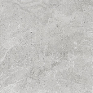 Baldosa cerámica gris claro efecto piedra con vetas y textura mate