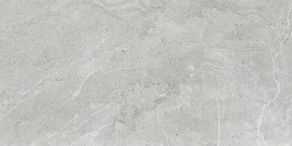 Baldosa cerámica gris claro efecto piedra con vetas y textura mate