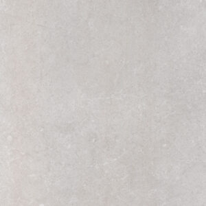 Baldosa cerámica gris claro con vetas sutiles efecto piedra