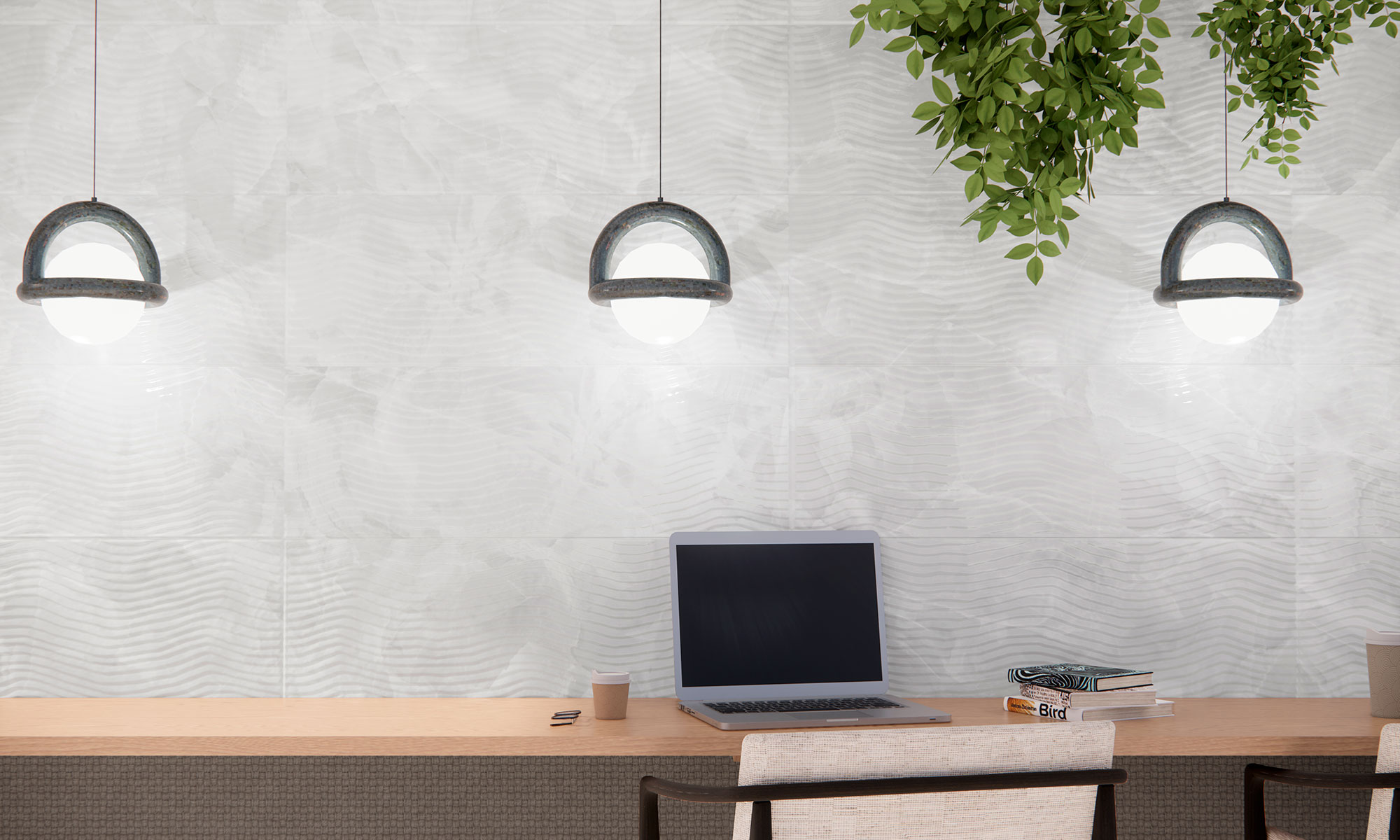 Panel de azulejos blancos texturizados con mesa, portátil y lámparas colgantes