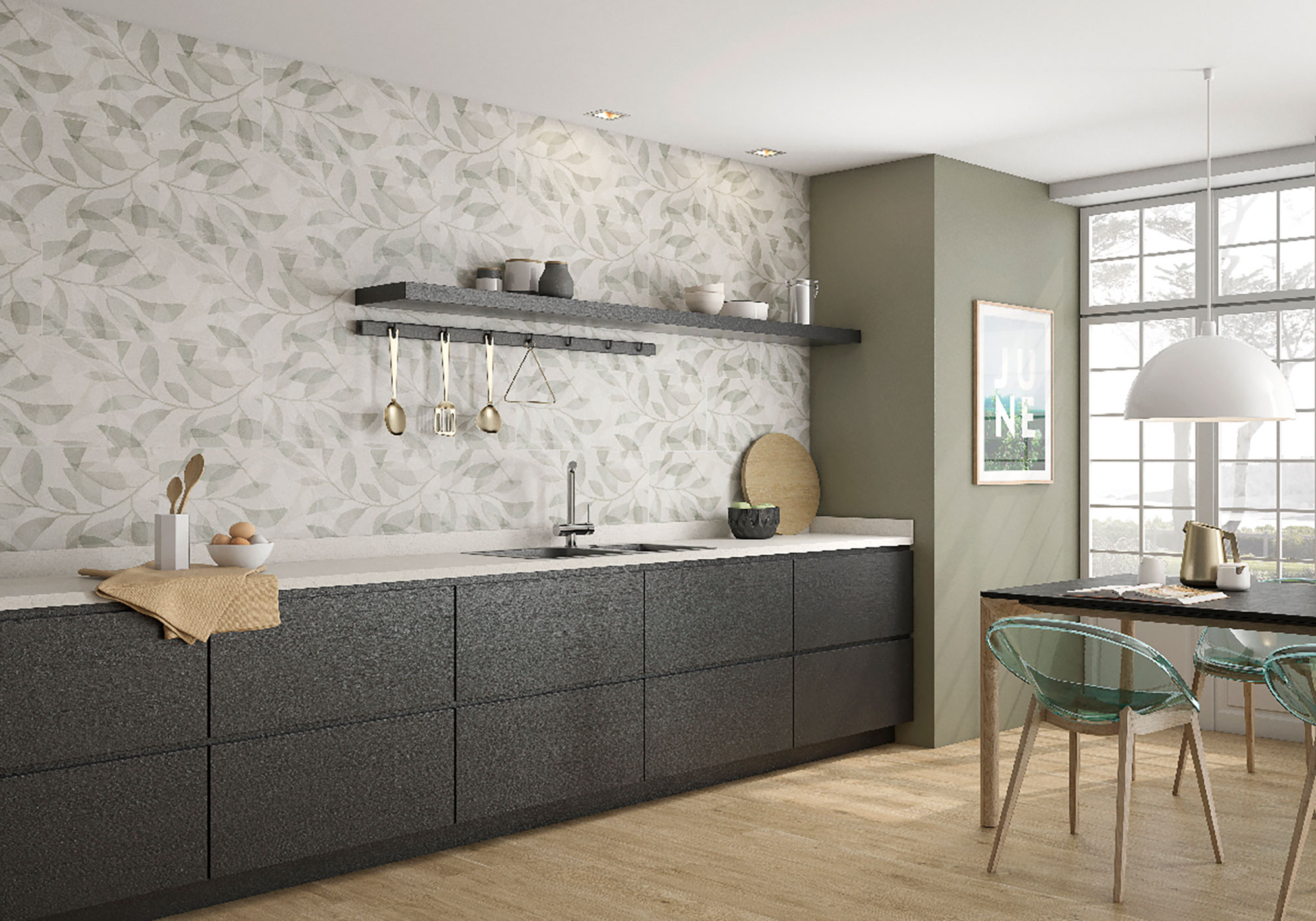 Cocina expositora con revestimiento cerámico de hoja, encimera clara y muebles oscuros.