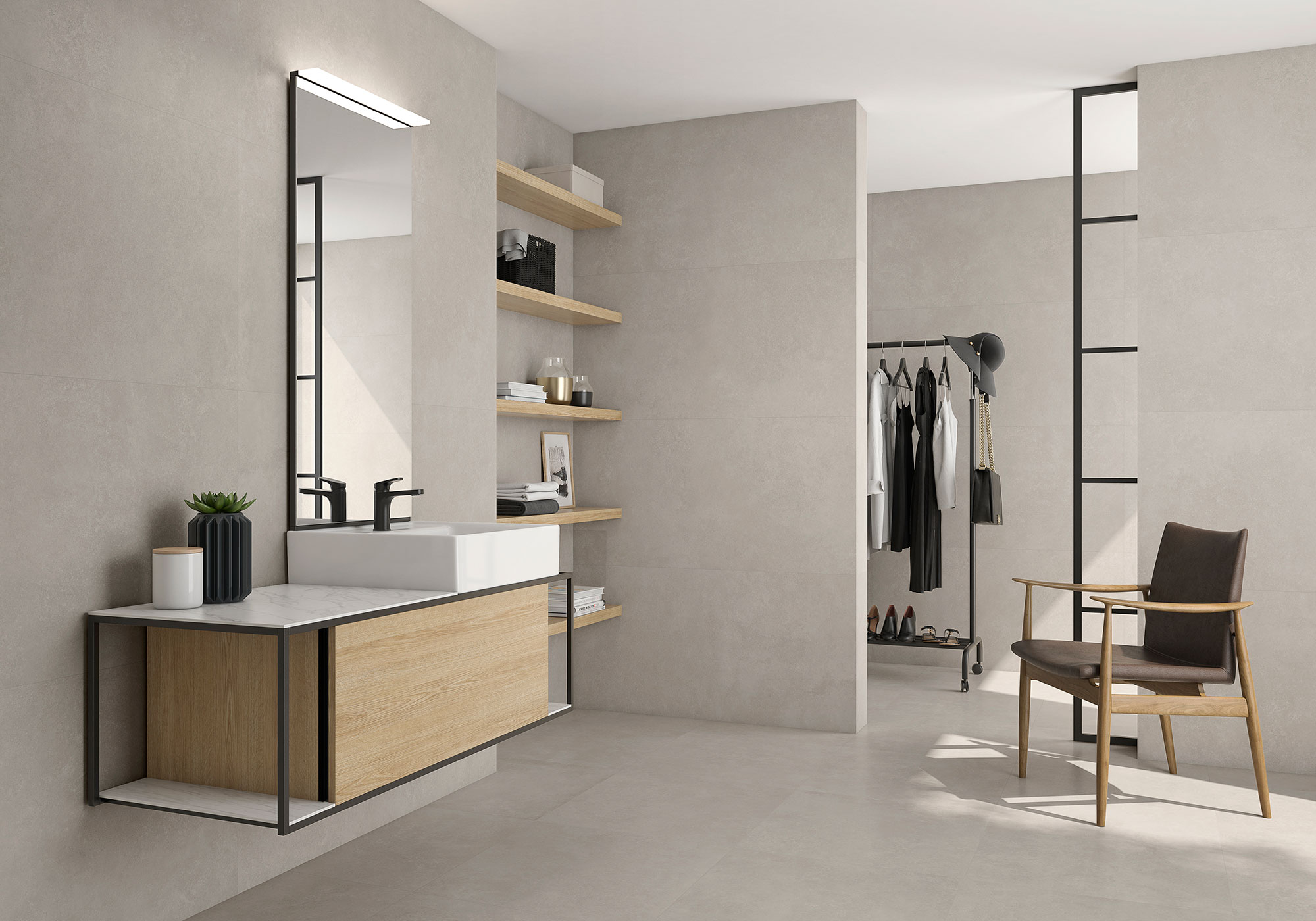 Baño minimalista con lavabo y mueble flotante en grandes azulejos neutros