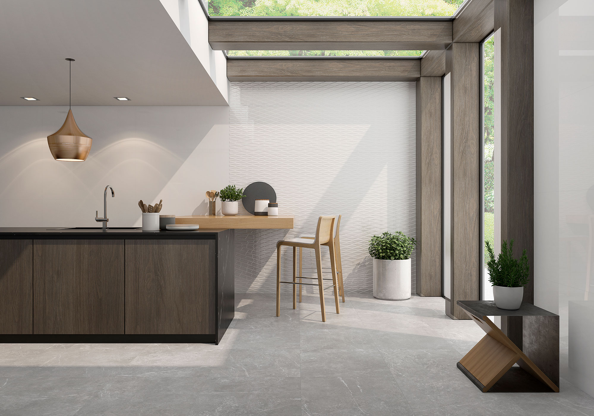 Ambiente de cocina en showroom con pavimento gris y revestimiento cerámico blanco texturado.