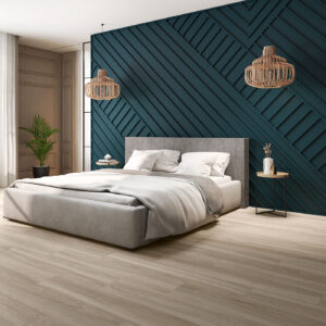 Dormitorio expositor con suelo cerámico efecto madera y pared decorativa geométrica azul