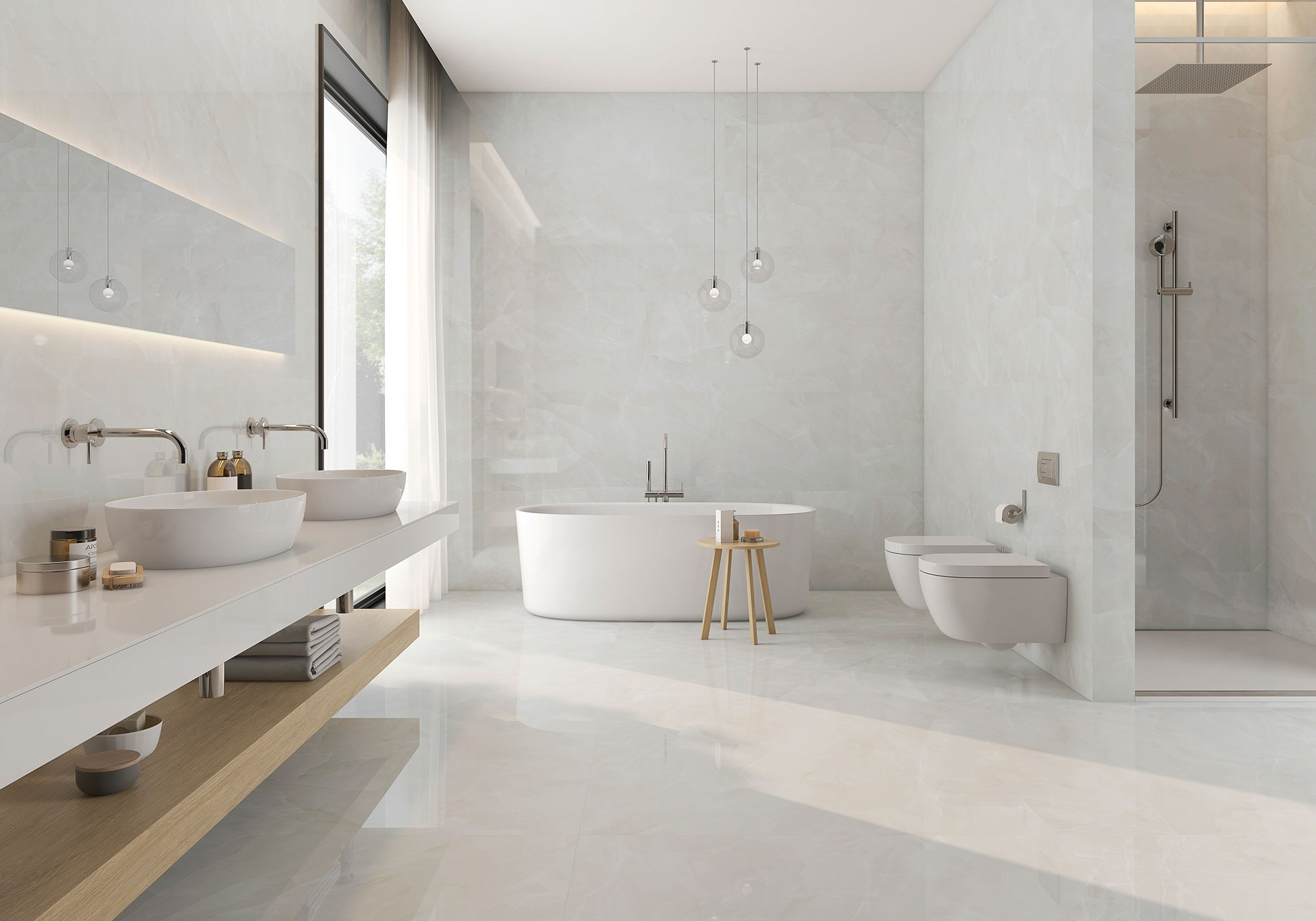 Baño de exposición con bañera exenta, doble lavabo, ducha y revestimiento cerámico jaspeado