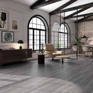 Showroom con pavimento cerámico gris efecto madera, ventanales arqueados y zona lounge