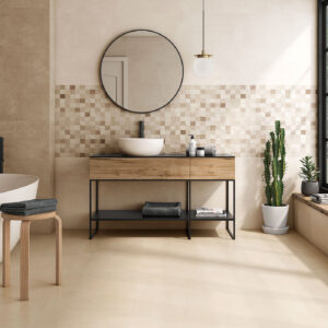 Baño moderno con pavimento y revestimiento cerámico en tonos beige, bañera, lavabo y espejo circular