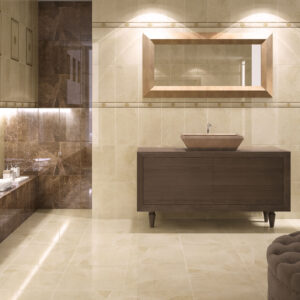 0859_ALAPLANA_chelsea-OK Baño con pavimento y revestimiento crema, franja y banco de mármol oscuro y mueble lavabo