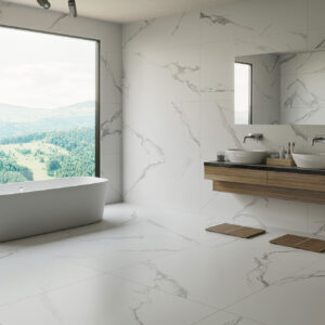 3168_ALAPLANA_PUNE_HQ Baño minimalista con azulejos efecto mármol, bañera exenta y doble lavabo frente a ventana