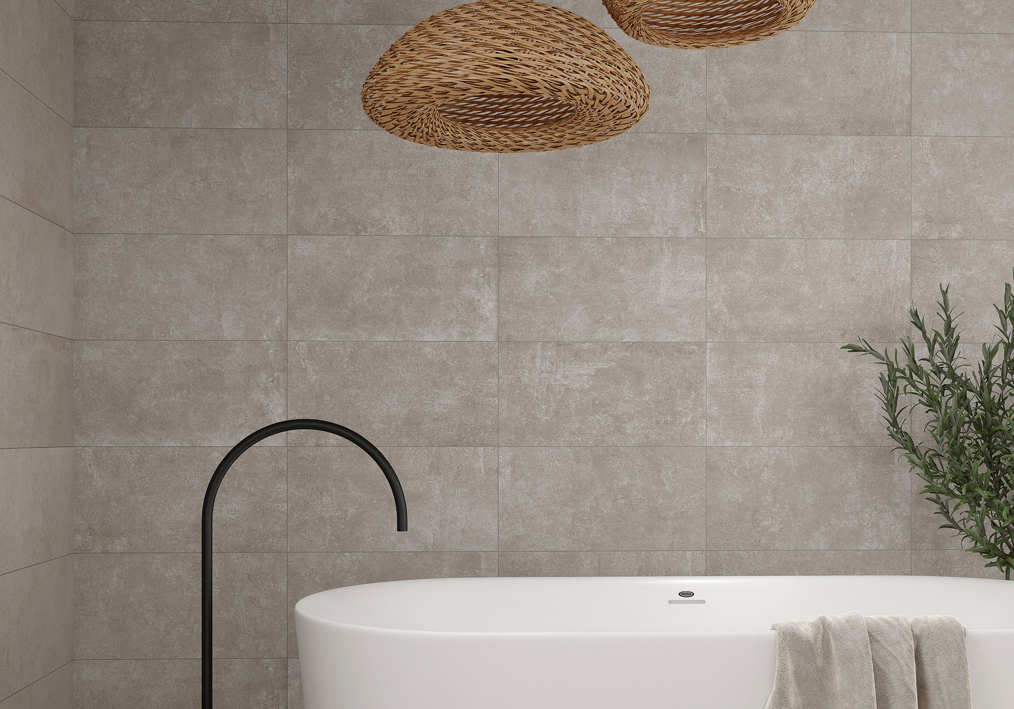 AMB-BONN-TAUPE-30X60-DETALLE Baño con bañera exenta, grifo negro y revestimiento cerámico beige de gran formato