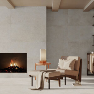 AMB-BONN-WHITE-MOSAIC-60X120 Showroom de pavimentos y revestimientos cerámicos con chimenea y zona de lectura.