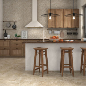 Cocina exposición: pavimento, paredes cerámicas; isla con encimera y tres taburetes.