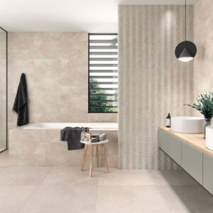 Baño de exposición con azulejos y pavimento cerámico beige, bañera, ducha y doble lavabo