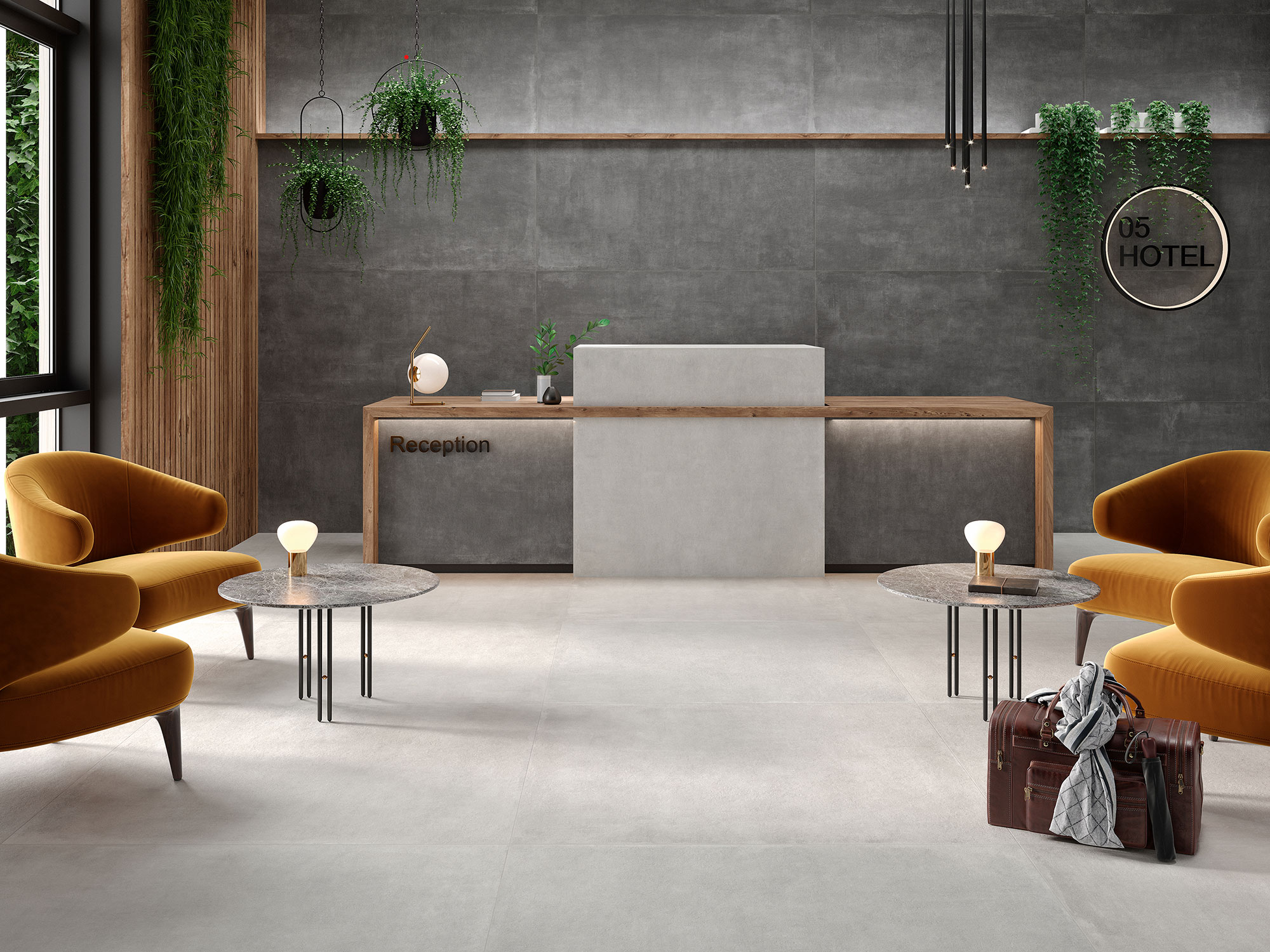 CASTLETON-ANTRACITA-75X150_GRIS-120X120 Recepción con pavimento y revestimiento cerámico gris, butacas mostaza, mostrador de madera