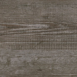 Baldosa cerámica efecto madera envejecida en tonos grisáceos con vetas y nudos