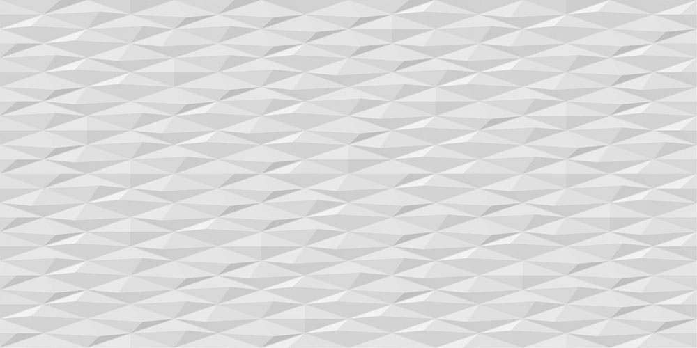 Revestimiento cerámico blanco con patrón geométrico tridimensional de triángulos