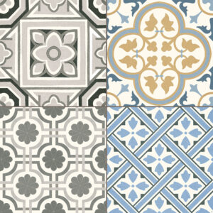 Cuatro azulejos cerámicos decorativos con motivos geométricos y florales en azul, gris y beige