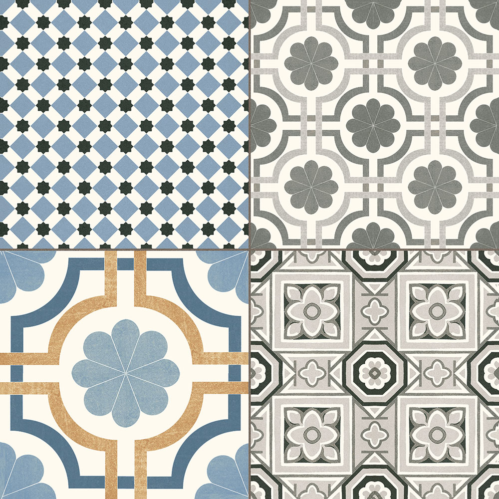 Cuatro azulejos hidráulicos con motivos geométricos y florales en tonos azul y gris